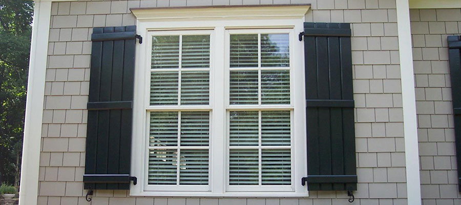 Enhancing Your Home's Aesthetics with Wooden Shutters: A Comprehensive Guide